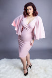 model in pink wiggle dress with butter fly sleeves